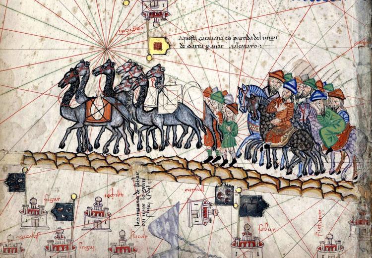 A 14th century painting depicting Marco Polo's caravan traveling along the Silk Road.